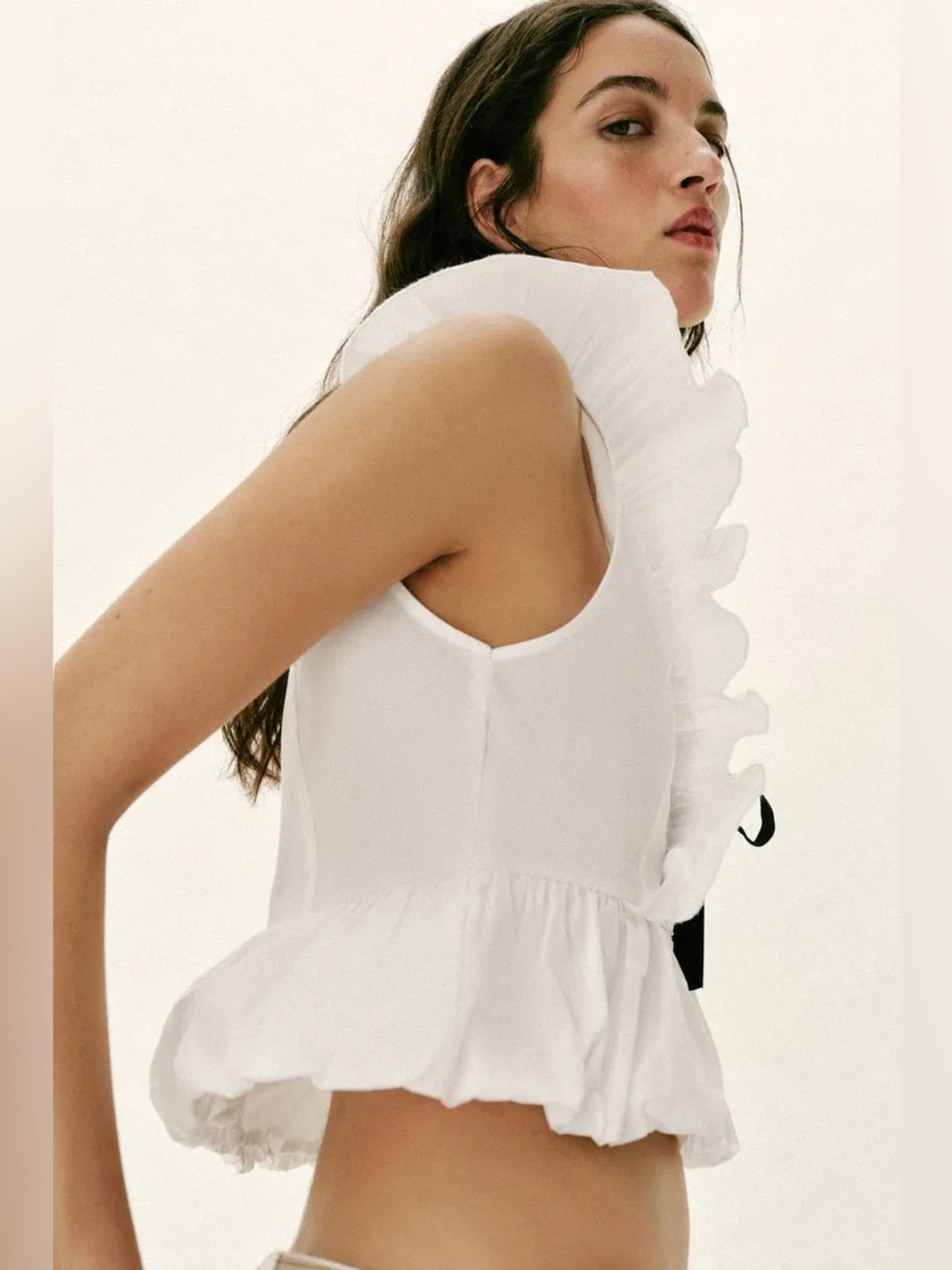Zara White Sleeveless Ruffled V-Neck Top with Black Bow. POP